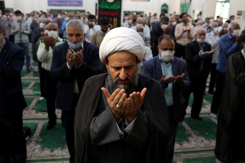 FILE PHOTO: Iranian worshippers attend the Friday prayers in Qarchak