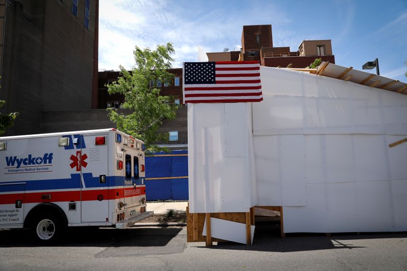 FILE PHOTO:  Temporary morgue outside Wyckoff Heights Medical Center
