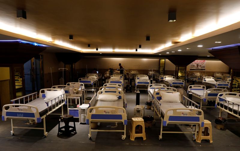 Beds are seen inside a banquet hall after it was