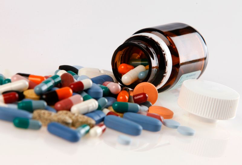 FILE PHOTO: Pharmaceutical tablets and capsules are arranged on a