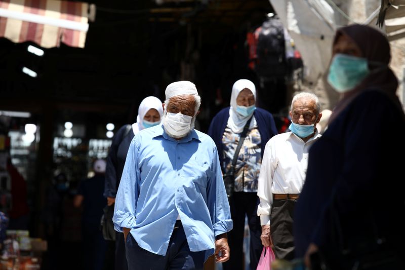 People wearing face masks to help fight the spread of
