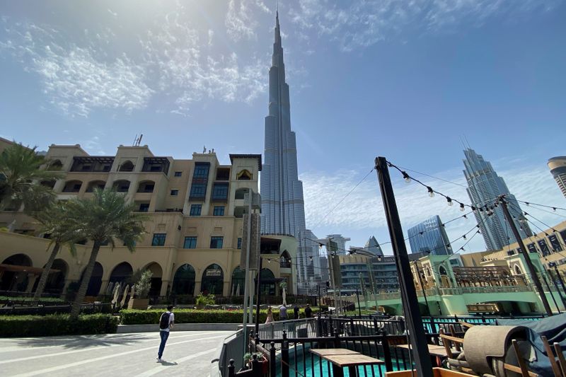 FILE PHOTO: People walk outside Dubai mall after the UAE