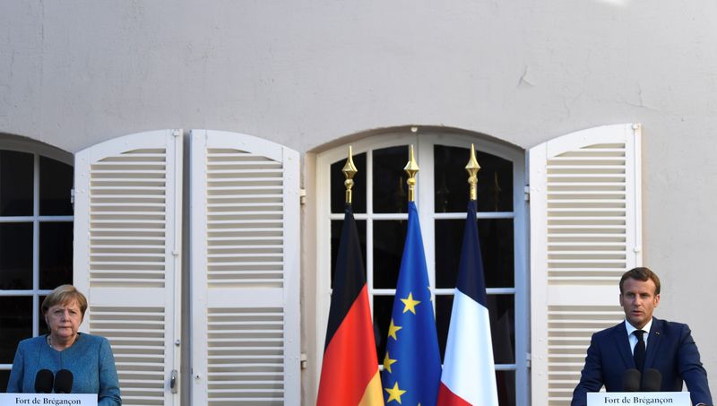 French President Emmanuel Macron and German Chancellor Angela Merkel meet