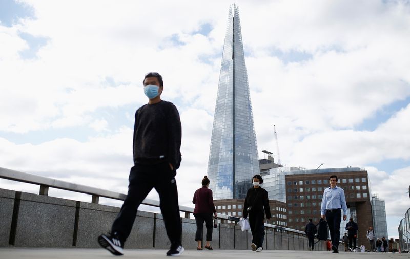 People walk over London Bridge, amid the coronavirus disease (COVID-19)