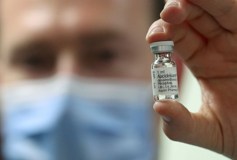 FILE PHOTO: A pharmacist displays an ampoule of Dexamethasone at