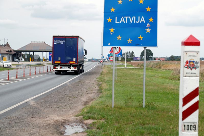 Truck enters Latvia at the border crossing point with Lithuania