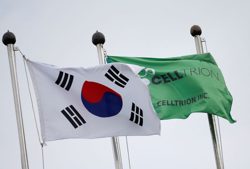 FILE PHOTO: Flags bearing the South Korean national flag and