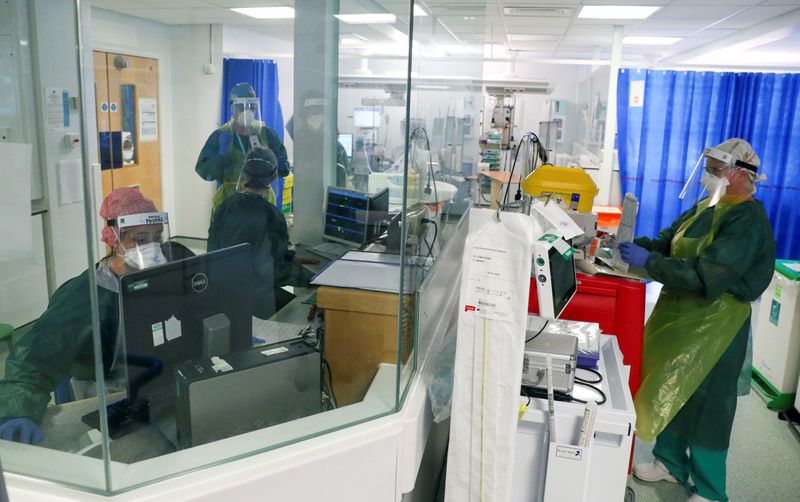 Medics work in an Intensive Care ward treating coronavirus disease