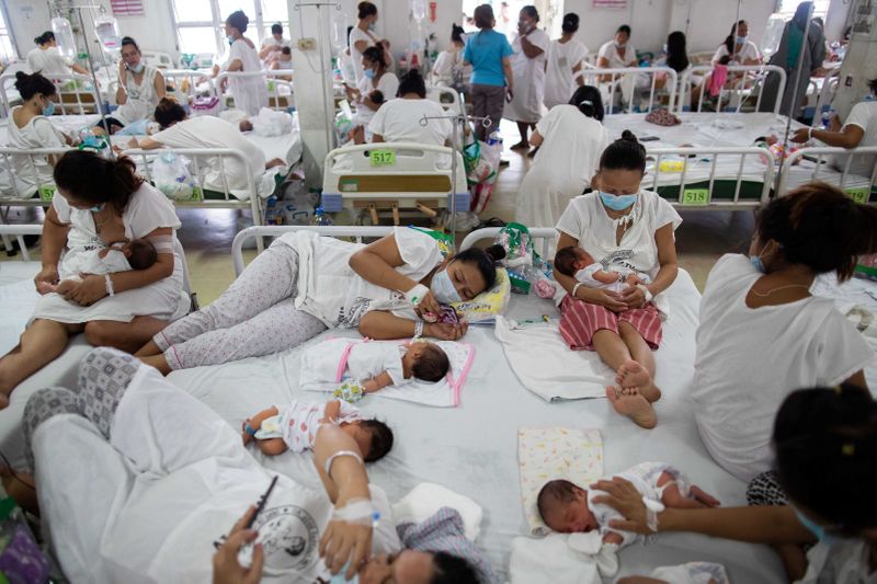 Mothers, newborns cram inside Philippines busiest maternity ward amid COVID-19
