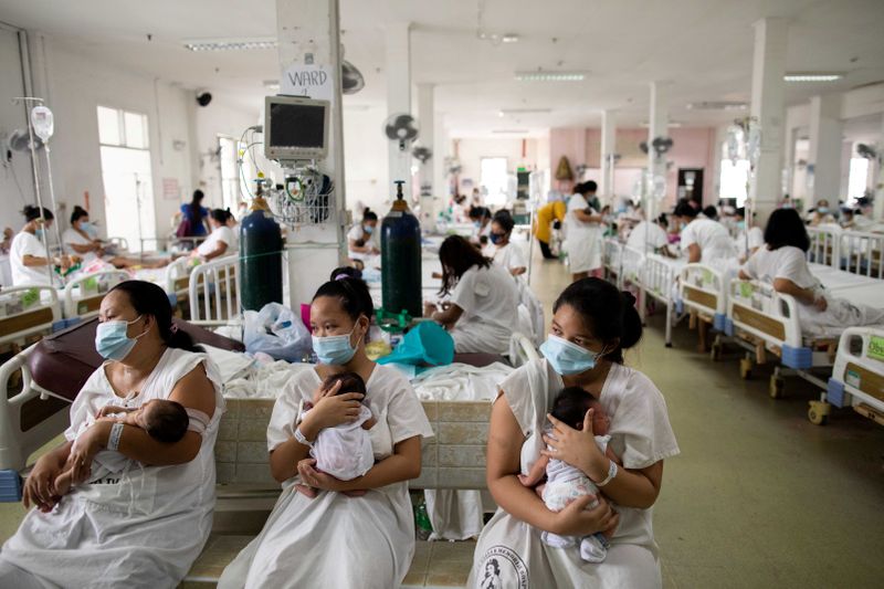 Mothers, newborns cram inside Philippines busiest maternity ward amid COVID-19
