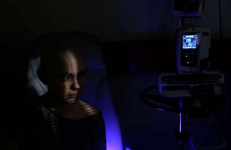 The Wider Image: The pandemic, a deadly cancer and my