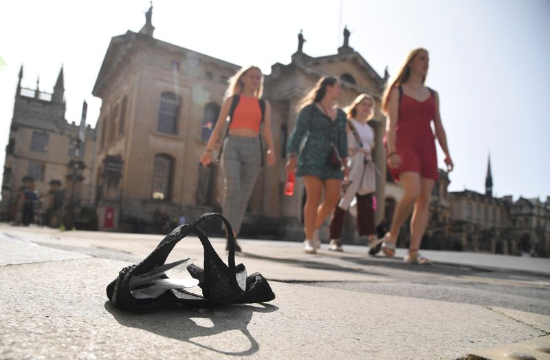 Students, residents and tourists go about their daily life amidst