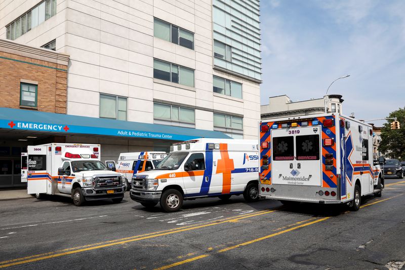 Ambulances line up outside Maimonides Medical Center, as the spread