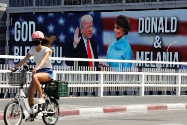 A billboard depicting U.S. President Donald Trump and his wife