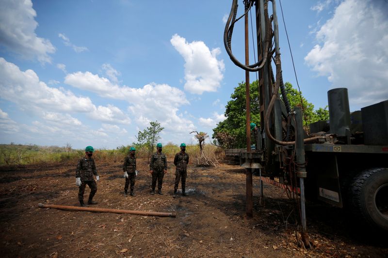 Members of the Brazilian Armed Forces  drill artesian wells