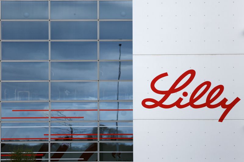 The logo of Lilly is seen on a wall of