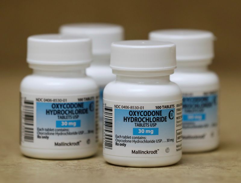 FILE PHOTO: Bottles of prescription painkillers Oxycodone Hydrochloride, 30mg pills,