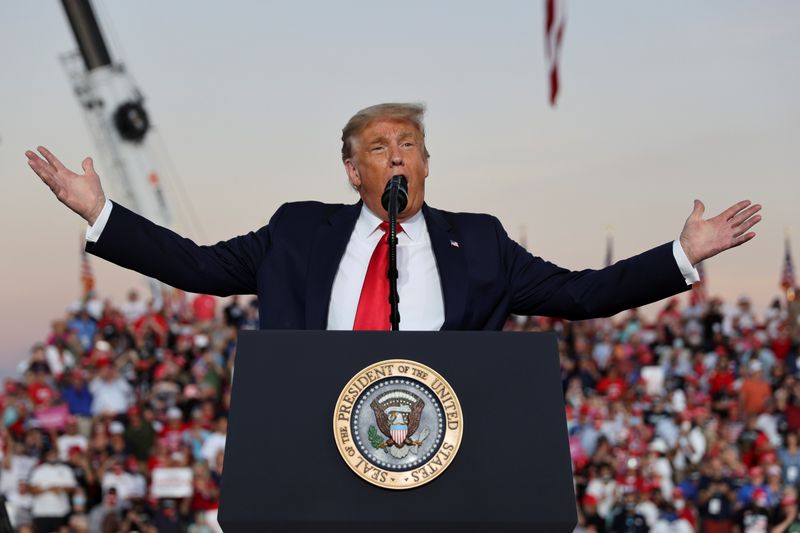FILE PHOTO: U.S. President Donald Trump holds a campaign rally