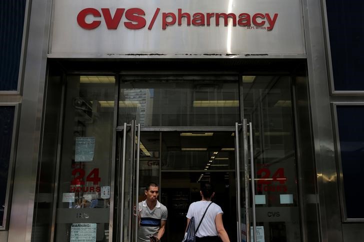 The CVS logo is seen at one of their stores