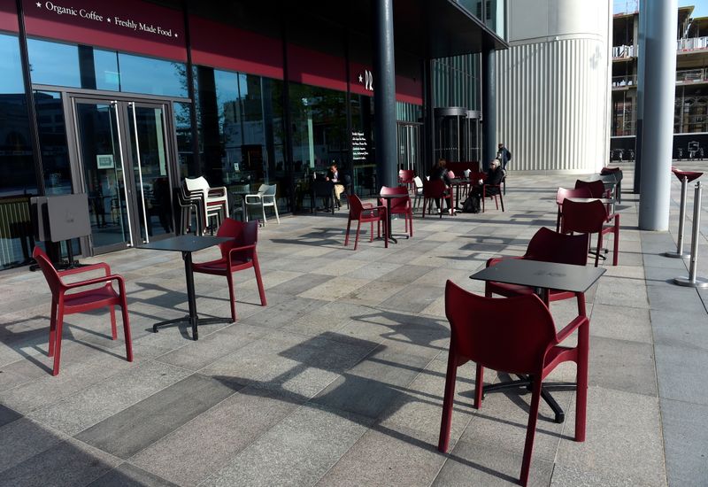 Empty seats in a cafe in the city centre as