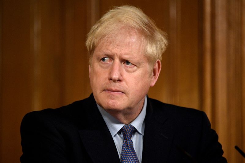 Britain’s Prime Minister Boris Johnson holds a news conference at