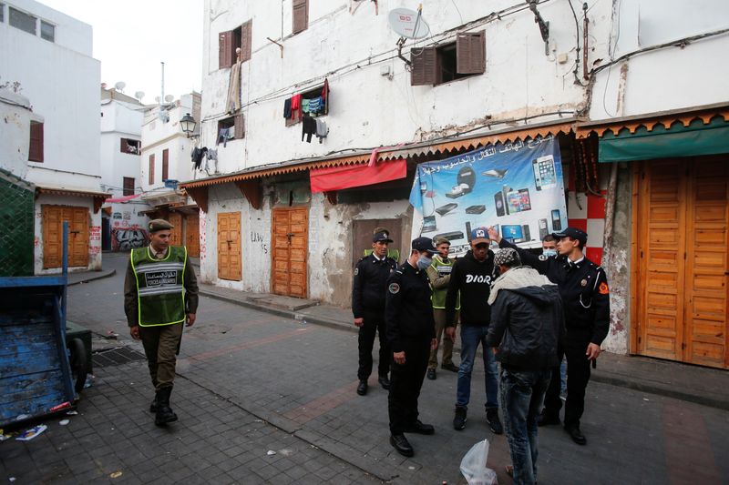 Police officers patrol streets in the old Medina in Casablanca