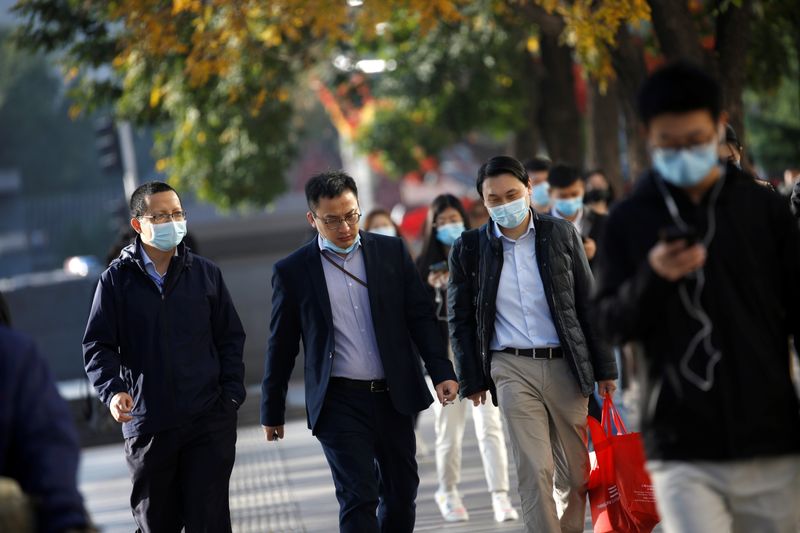 People wearing masks following the coronavirus disease (COVID-19) outbreak are