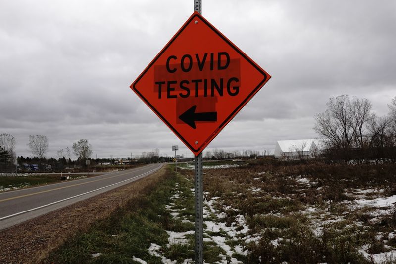 FILE PHOTO: A sign for a COVID-19 drive-thru testing site