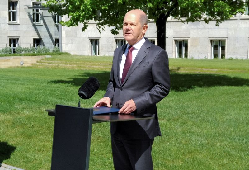 German Finance Minister Olaf Scholz gives a statement in the