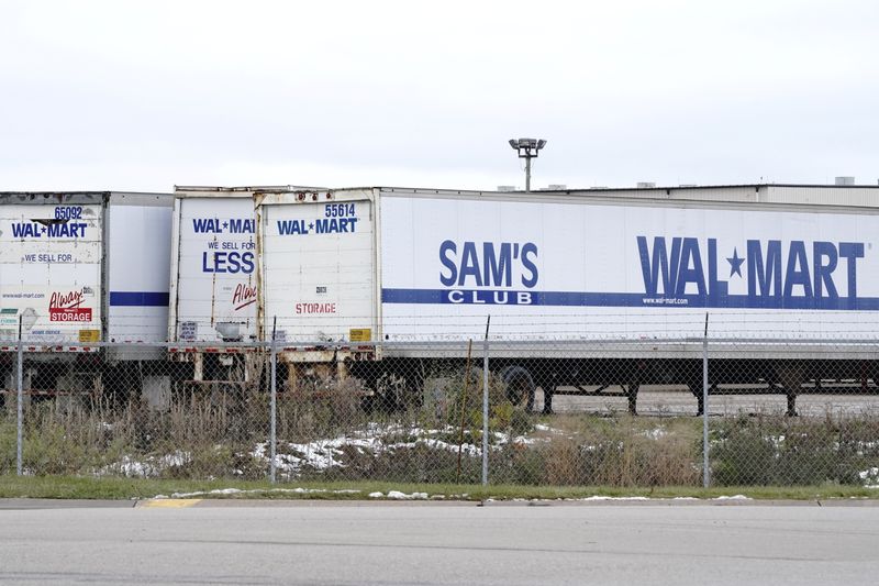 Trailers bearing the Walmart and Sam’s Club logos are seen