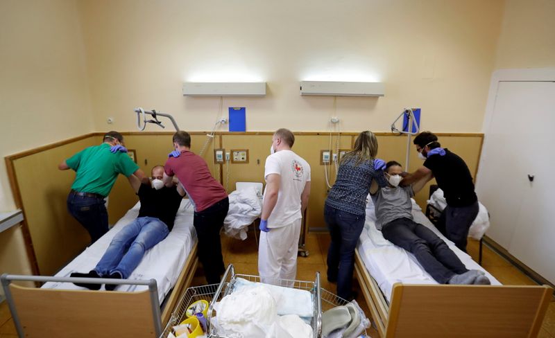 Czech volunteers heed call to aid hospitals strained by COVID-19