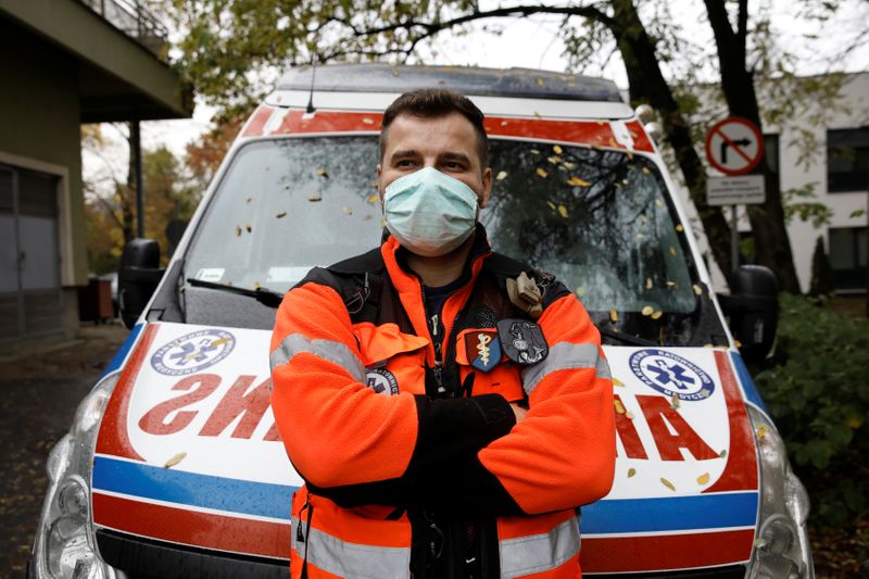 Paramedic Marcin Serwach, 35, attends an interview with Reuters amid