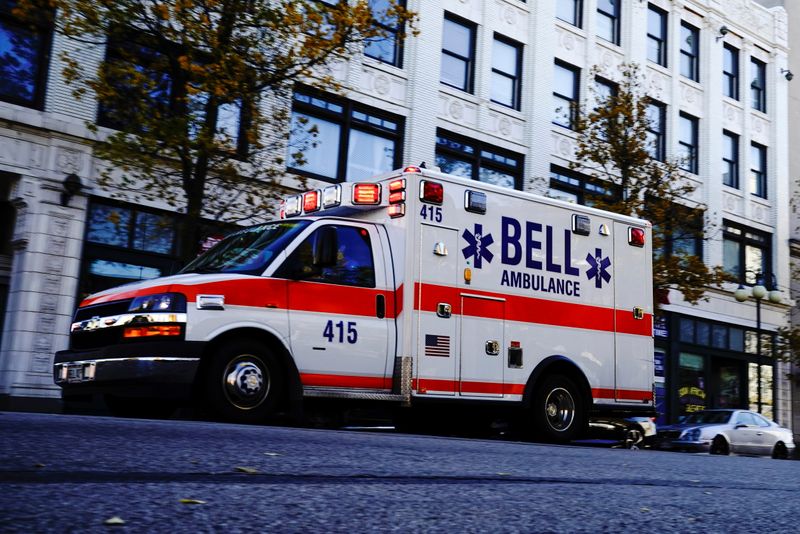 A Bell Ambulance speeds through the Bronzeville neighborhood on the