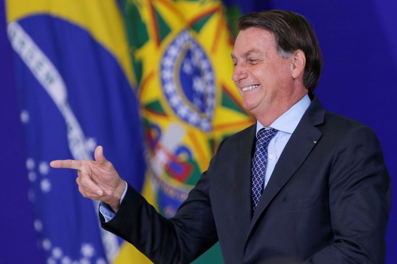 Brazil’s President Jair Bolsonaro gestures during a ceremony at the