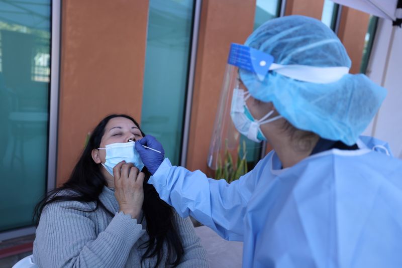 Rosio Osuna, 47, is tested for the coronavirus disease (COVID-19),