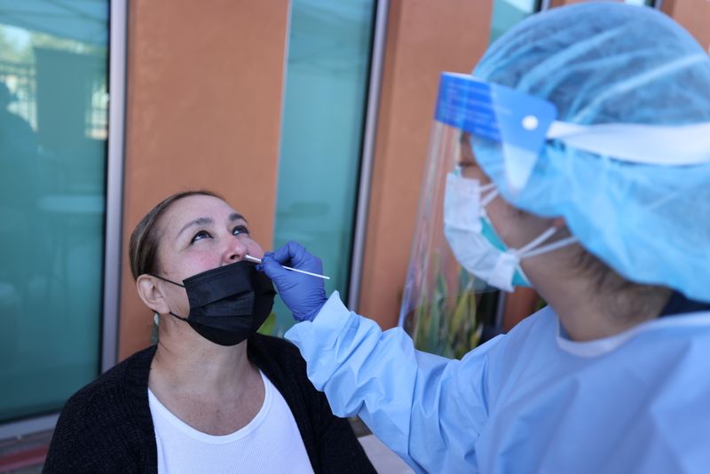 Alma Perez, 55, is tested for the coronavirus disease (COVID-19),