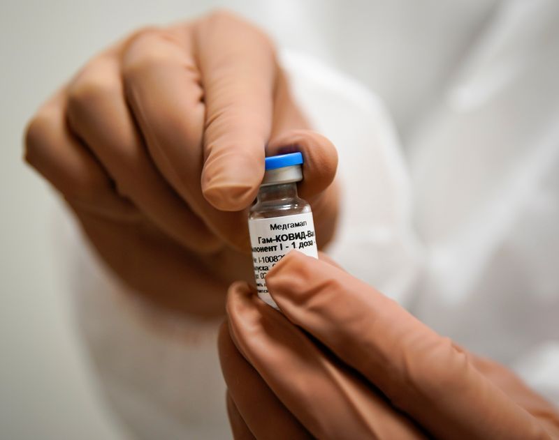 A nurse prepares Russia’s  “Sputnik-V” vaccine against the coronavirus