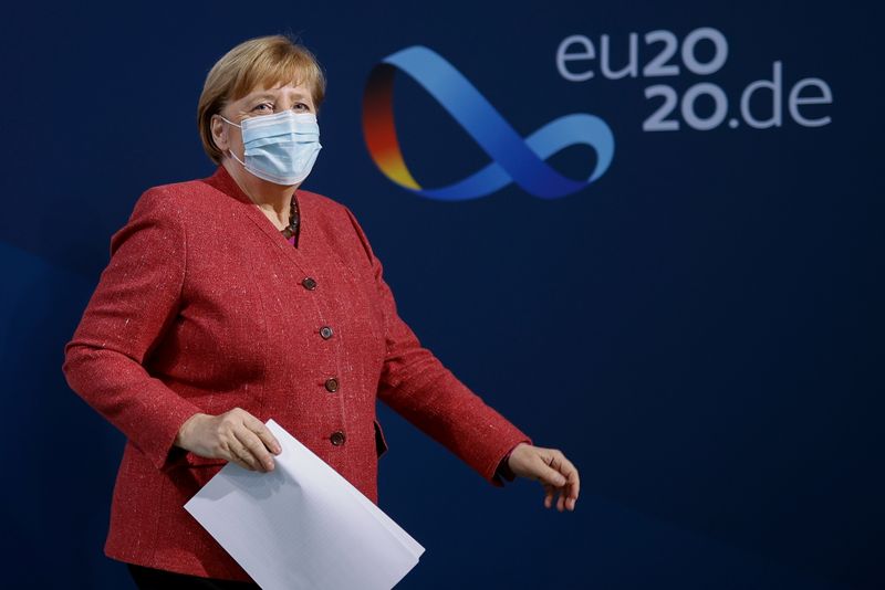 German Chancellor Angela Merkel attends a news conference on COVID-19