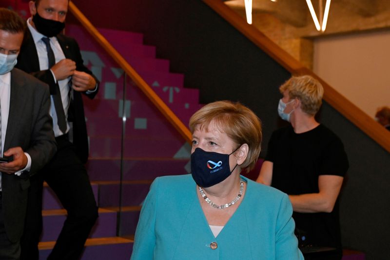 German Chancellor Merkel leaves CDU/CSU meeting in Berlin