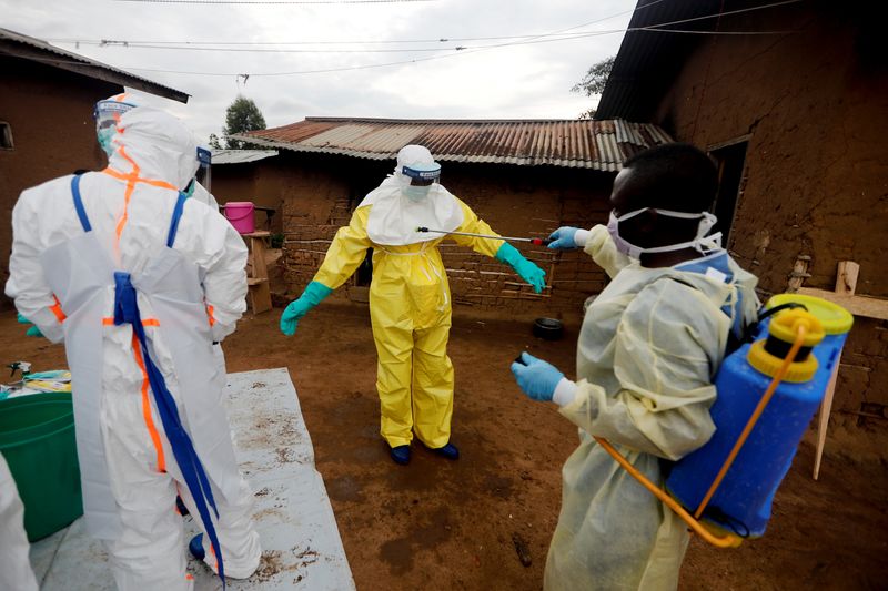 The Wider Image: Ebola survivors battle grief and stigma in