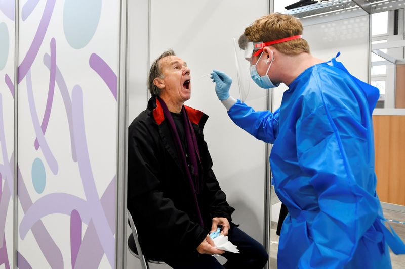 FILE PHOTO: Man is tested on the coronavirus disease (COVID-19)