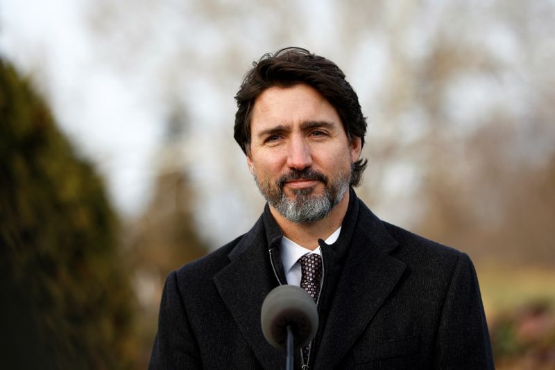 Canada’s Prime Minister Justin Trudeau takes part in a news
