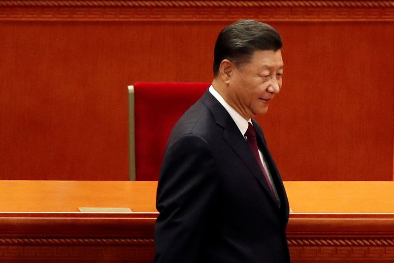 FILE PHOTO: Chinese President Xi Jinping arrives for a meeting