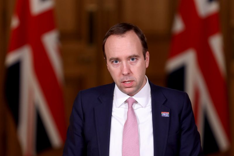 Britain’s Health Secretary Matt Hancock attends a media briefing at