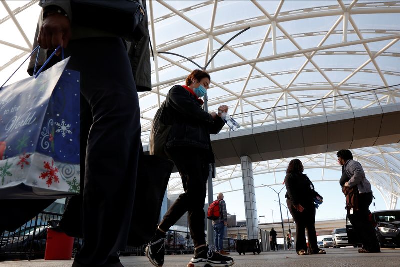 Travelers depart Hartsfield–Jackson Atlanta International Airport ahead of the Thanksgiving