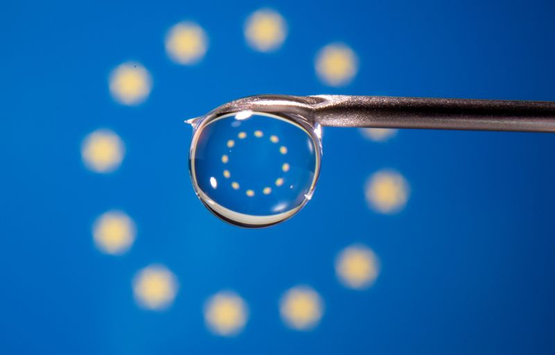 The EU flag is reflected in a drop on a