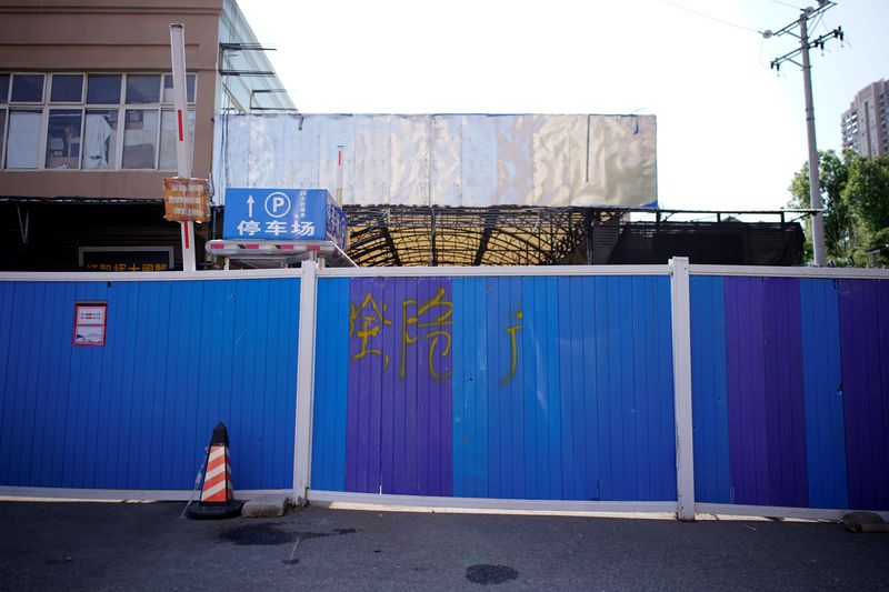 Blocked entrance to Huanan seafood market, where the coronavirus that