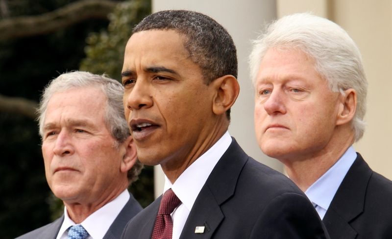 FILE PHOTO: U.S. President Barack Obama is joined by former