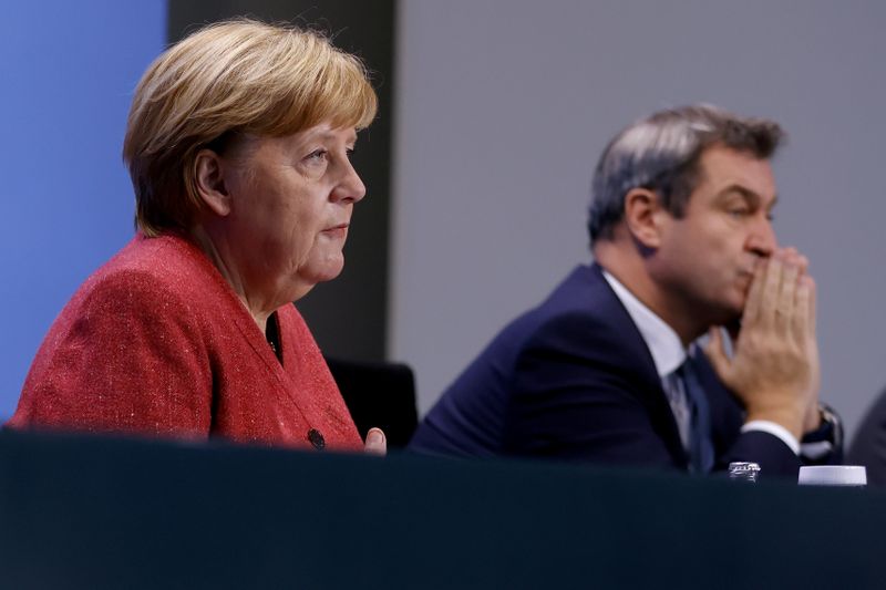 FILE PHOTO: German Chancellor Angela Merkel and Bavaria Premier Markus