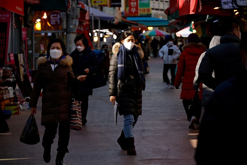 FILE PHOTO: People shop amid the coronavirus disease (COVID-19) pandemic